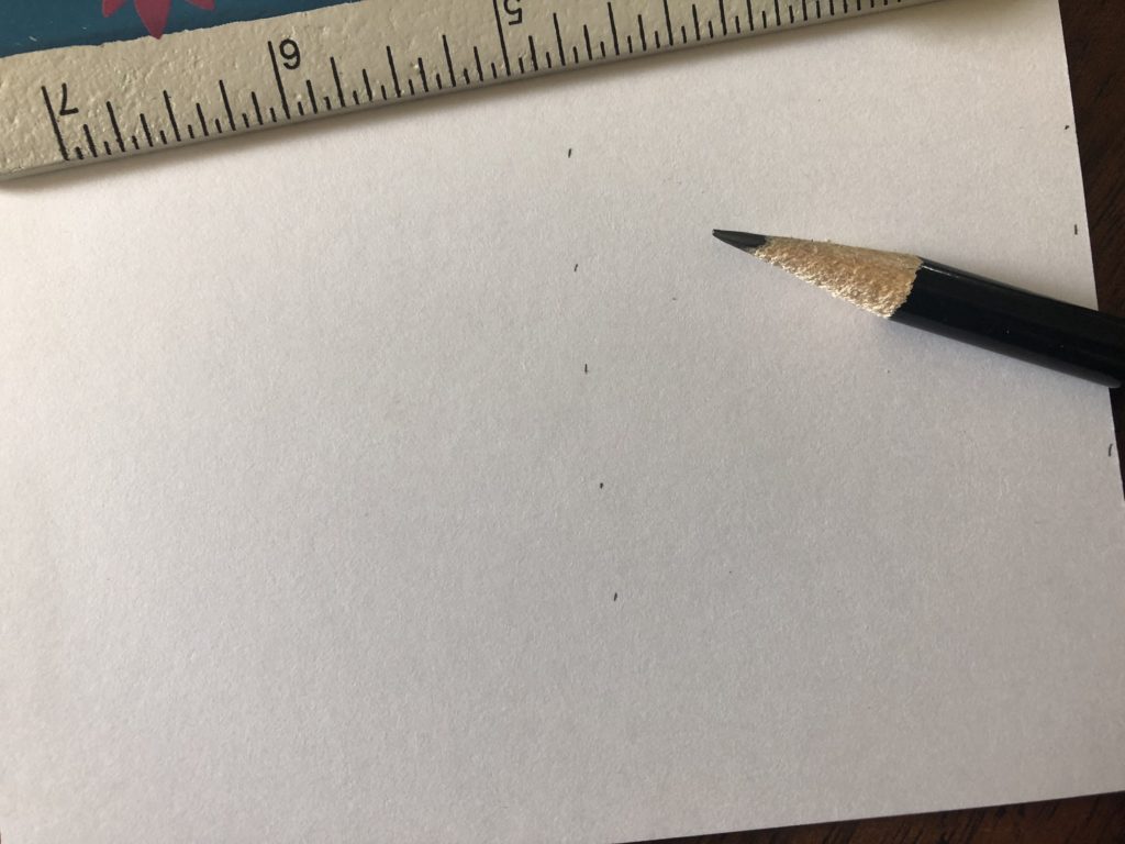 Use a ruler and pencil to help your handwriting move in a straight line across your letter.